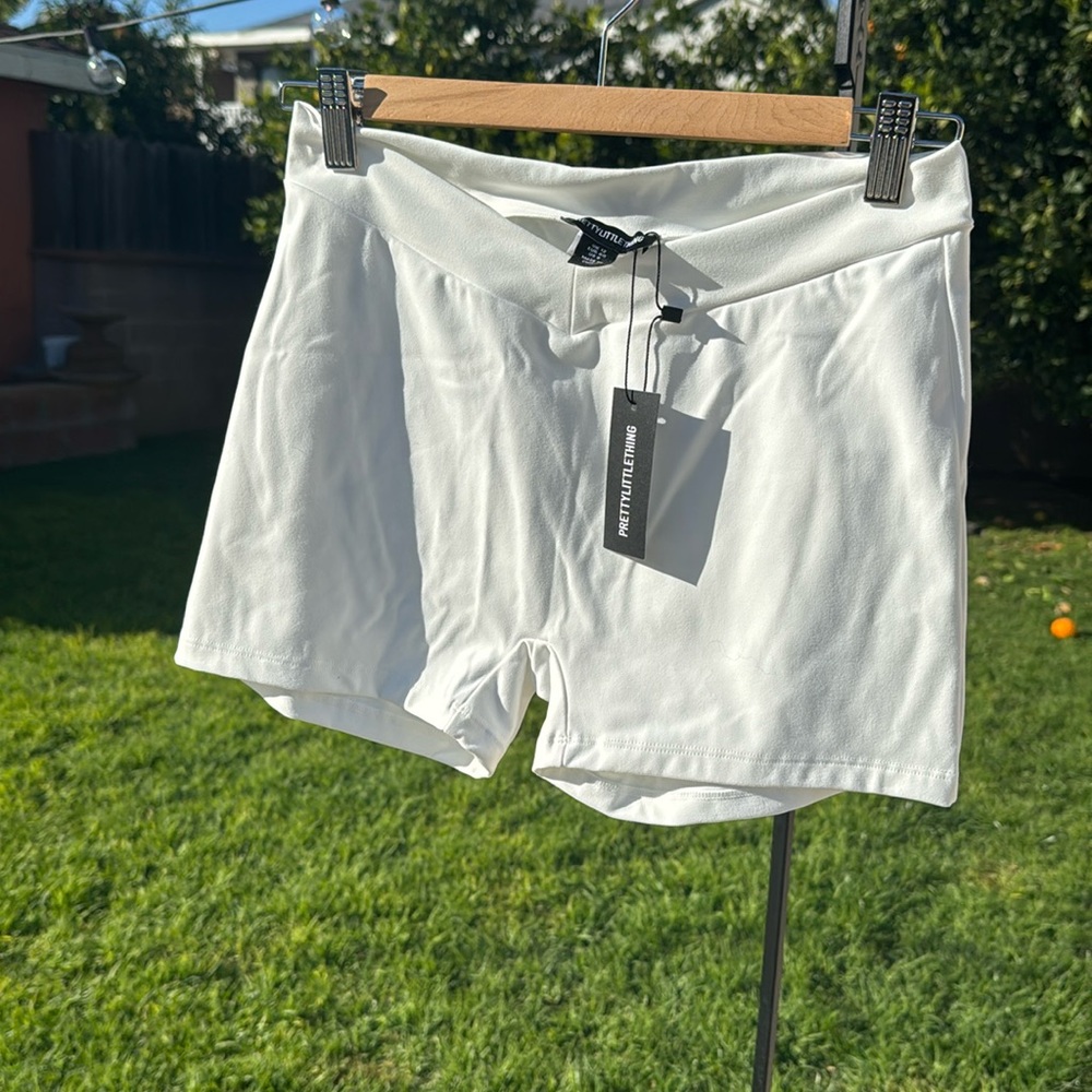 Women’s white athletic shorts, size 8